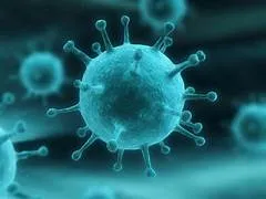 imagem azul de uma bolinha cheia de espinhos sugerindo um vírus