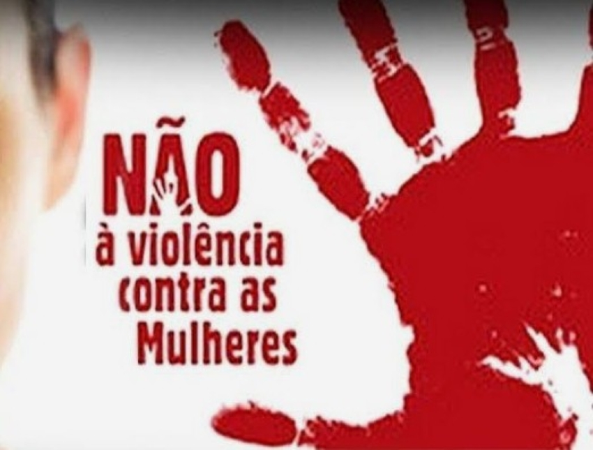 desenho em vermelho sangue de uma mão feminina dando basta